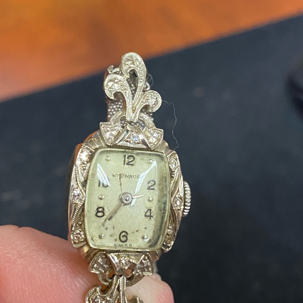 - Antique Wittnauer Women’s Watch.  Over 51 years old.  Original silver band